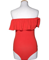 La garantie Once Again : 560216 vêtements d'occasion de marque en état irréprochable.