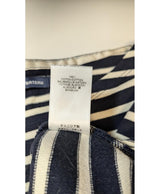 La garantie Once Again : 560234 vêtements d'occasion de marque en état irréprochable.