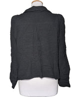 La garantie Once Again : 560274 vêtements d'occasion de marque en état irréprochable.