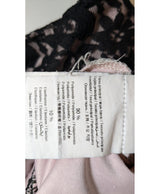 La garantie Once Again : 560369 vêtements d'occasion de marque en état irréprochable.
