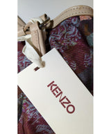 La garantie Once Again : 560423 vêtements d'occasion de marque en état irréprochable.