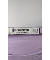 La garantie Once Again : 560439 vêtements d'occasion de marque en état irréprochable.