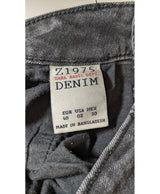 La garantie Once Again : 560496 vêtements d'occasion de marque en état irréprochable.