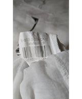La garantie Once Again : 560500 vêtements d'occasion de marque en état irréprochable.