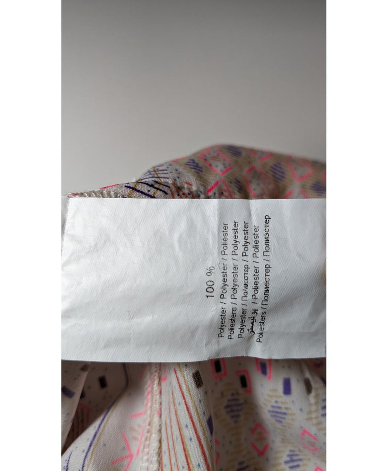 Élégance responsable avec cette pièce vintage 560512 en parfait état, sélectionnée par Once Again.