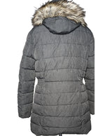 La garantie Once Again : 560645 vêtements d'occasion de marque en état irréprochable.