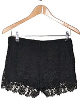 La garantie Once Again : 560673 vêtements d'occasion de marque en état irréprochable.