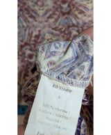 La garantie Once Again : 560758 vêtements d'occasion de marque en état irréprochable.