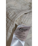 La garantie Once Again : 560779 vêtements d'occasion de marque en état irréprochable.