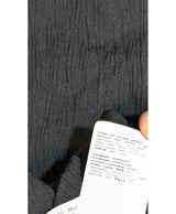 La garantie Once Again : 560785 vêtements d'occasion de marque en état irréprochable.
