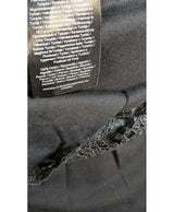 La garantie Once Again : 560805 vêtements d'occasion de marque en état irréprochable.