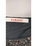 La garantie Once Again : 560839 vêtements d'occasion de marque en état irréprochable.