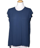La garantie Once Again : 560840 vêtements d'occasion de marque en état irréprochable.
