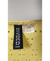 La garantie Once Again : 560923 vêtements d'occasion de marque en état irréprochable.