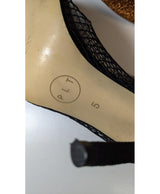 La garantie Once Again : 560974 vêtements d'occasion de marque en état irréprochable.