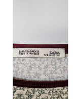 La garantie Once Again : 560993 vêtements d'occasion de marque en état irréprochable.