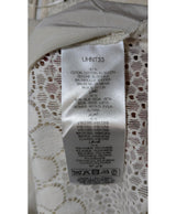 La garantie Once Again : 561105 vêtements d'occasion de marque en état irréprochable.
