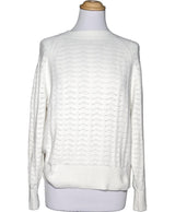 La garantie Once Again : 561236 vêtements d'occasion de marque en état irréprochable.