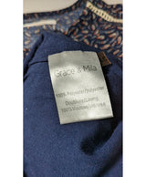 La garantie Once Again : 561333 vêtements d'occasion de marque en état irréprochable.