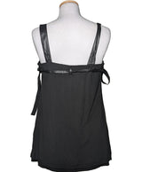 La garantie Once Again : 561720 vêtements d'occasion de marque en état irréprochable.