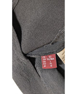 La garantie Once Again : 561721 vêtements d'occasion de marque en état irréprochable.