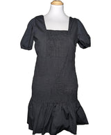 La garantie Once Again : 561735 vêtements d'occasion de marque en état irréprochable.