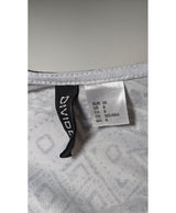 La garantie Once Again : 561800 vêtements d'occasion de marque en état irréprochable.