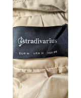 La garantie Once Again : 561815 vêtements d'occasion de marque en état irréprochable.