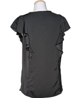 La garantie Once Again : 561836 vêtements d'occasion de marque en état irréprochable.