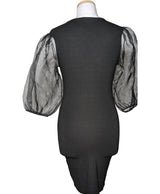 La garantie Once Again : 561839 vêtements d'occasion de marque en état irréprochable.