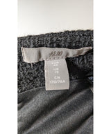 La garantie Once Again : 561860 vêtements d'occasion de marque en état irréprochable.