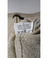 La garantie Once Again : 561902 vêtements d'occasion de marque en état irréprochable.