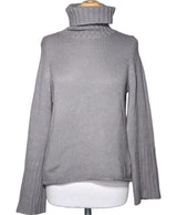 La garantie Once Again : 562269 vêtements d'occasion de marque en état irréprochable.
