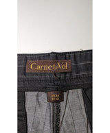 La garantie Once Again : 562324 vêtements d'occasion de marque en état irréprochable.
