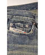 La garantie Once Again : 562355 vêtements d'occasion de marque en état irréprochable.