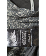 La garantie Once Again : 562414 vêtements d'occasion de marque en état irréprochable.