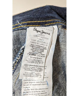 La garantie Once Again : 562465 vêtements d'occasion de marque en état irréprochable.