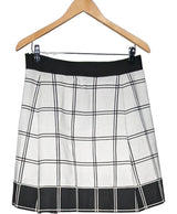 La garantie Once Again : 562466 vêtements d'occasion de marque en état irréprochable.