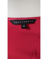 La garantie Once Again : 562492 vêtements d'occasion de marque en état irréprochable.
