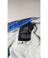 La garantie Once Again : 562575 vêtements d'occasion de marque en état irréprochable.