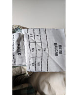 La garantie Once Again : 562607 vêtements d'occasion de marque en état irréprochable.