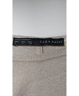 La garantie Once Again : 562657 vêtements d'occasion de marque en état irréprochable.