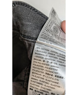 La garantie Once Again : 562893 vêtements d'occasion de marque en état irréprochable.