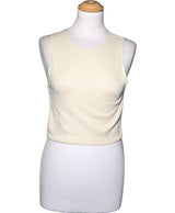 La garantie Once Again : 562984 vêtements d'occasion de marque en état irréprochable.