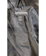 La garantie Once Again : 563125 vêtements d'occasion de marque en état irréprochable.