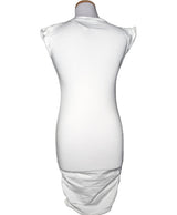 La garantie Once Again : 563134 vêtements d'occasion de marque en état irréprochable.