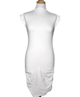La garantie Once Again : 563139 vêtements d'occasion de marque en état irréprochable.