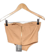 La garantie Once Again : 563228 vêtements d'occasion de marque en état irréprochable.