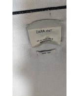 La garantie Once Again : 563286 vêtements d'occasion de marque en état irréprochable.