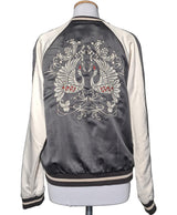 La garantie Once Again : 563375 vêtements d'occasion de marque en état irréprochable.